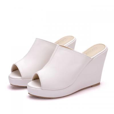 White wedge-shaped shoes